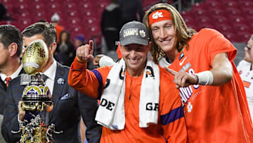 Clemson Head Coach Dabo Swinney and Clemson quarterback Trevor Lawrence (16) celebrate a 29-23 win over Ohio State at the PlayStation Fiesta Bowl at State Farm Stadium in Glendale, Arizona Saturday, December 28, 2019.

Clemson Vs Ohio State Fiesta Bowl