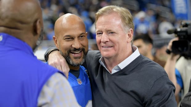 Actor Keegan-Michael Key (left) talks with NFL Commissioner, Roger Goodell, before the Detroit Lions game against the Bears.