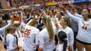 THe Texas Longhorns huddle during a timeout in the scrimmage volleyball match against UTSA at Gregory Gym on Saturday, Aug. 17, 2024 in Austin.