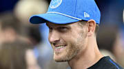 Nov 28, 2024; Detroit, Michigan, USA; Detroit Lions offensive coordinator Ben Johnson talks with fans on the sidelines during pregame warmups before their game against the Chicago Bears at Ford Field. Mandatory Credit: Lon Horwedel-Imagn Images