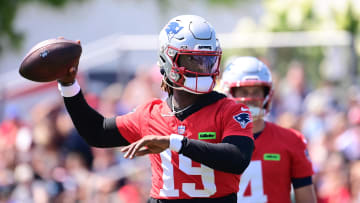 Jul 26, 2024; Foxborough, MA, USA; New England Patriots quarterback Joe Milton III (19) throws a pass during training camp at Gillette Stadium. Mandatory Credit: Eric Canha-USA TODAY Sports