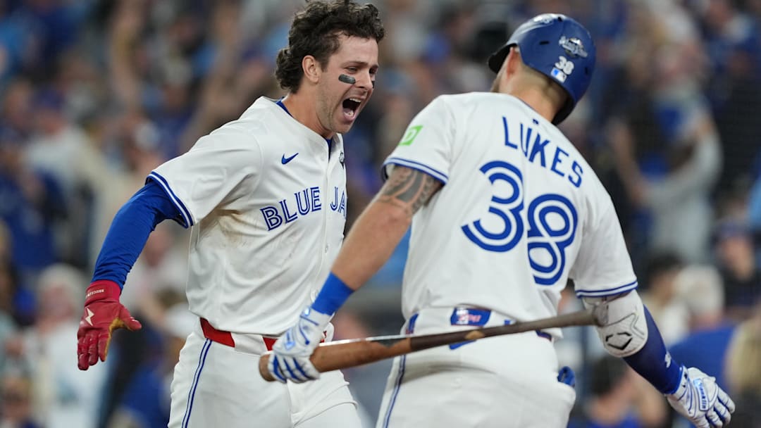 Nov 1, 2025; Toronto, Ontario, CAN; Toronto Blue Jays third baseman Ernie Clement (22) reacts after scoring a run against the Los Angeles Dodgers in the sixth inning for game seven of the 2025 MLB World Series at Rogers Centre. Nov 1, 2025; Toronto, Ontario, CAN; Toronto Blue Jays third baseman Ernie Clement (22) reacts after scoring a run against the Los Angeles Dodgers in the sixth inning for game seven of the 2025 MLB World Series at Rogers Centre.