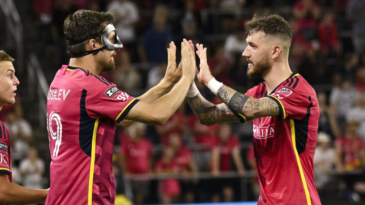 Jul 27, 2024; St. Louis, Missouri, USA; St. Louis CITY SC midfielder Indiana Vassilev (19) and St. Louis CITY SC midfielder Marcel Hartel (17) during the match against FC Dallas at CITYPARK. Mandatory Credit: Scott Rovak-USA TODAY Sports