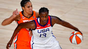 Jul 14, 2021; Las Vegas, NV, USA; Team USA center Sylvia Fowles (13) dribbles around WNBA All Star forward Brionna Jones (42) during the WNBA All Star Game at Michelob Ultra Arena at Mandalay Bay Resort. Mandatory Credit: Stephen R. Sylvanie-Imagn Images