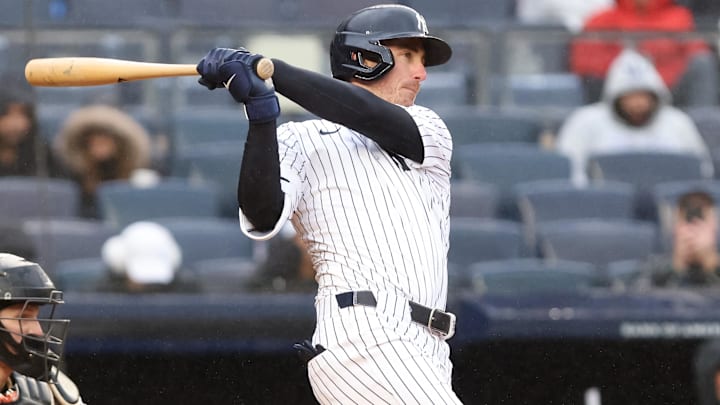 Apr 12, 2025; Bronx, New York, USA; New York Yankees outfielder Cody Bellinger (35) hits an RBI single against the San Francisco Giants during the fifth inning at Yankee Stadium. Apr 12, 2025; Bronx, New York, USA; New York Yankees outfielder Cody Bellinger (35) hits an RBI single against the San Francisco Giants during the fifth inning at Yankee Stadium.
