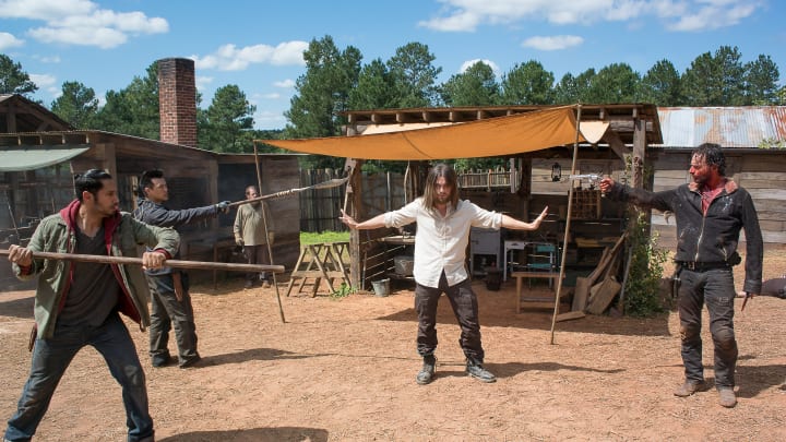 Peter Zimmerman as Eduardo, Rich Ceraulo as Guard, Tom Payne as Jesus, and Andrew Lincoln as Rick Grimes - The Walking Dead _ Season 6, Episode 11 - Photo Credit: Gene Page/AMC