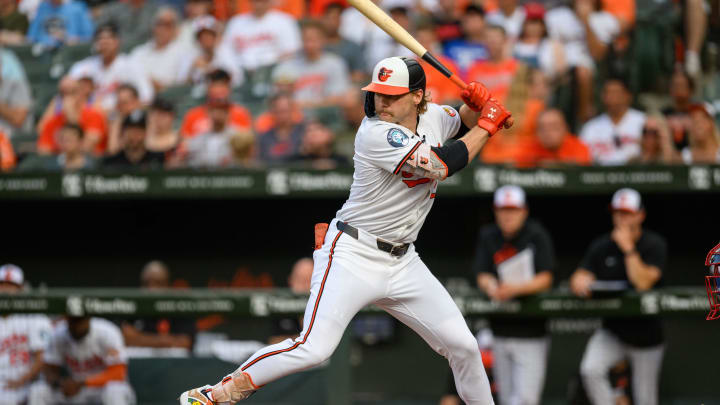 Jun 30, 2024; Baltimore, Maryland, USA; Baltimore Orioles shortstop Gunnar Henderson (2) at bat during the first inning against the Texas Rangers at Oriole Park at Camden Yards. 