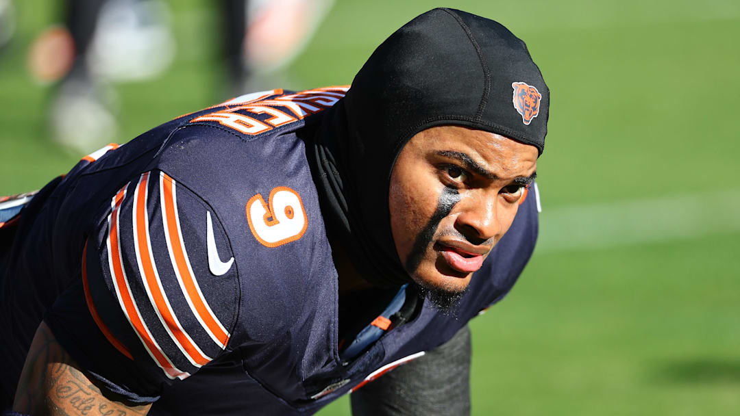 Nov 23, 2025; Chicago, Illinois, USA; Chicago Bears safety Jaquan Brisker (9) stretches before the game against the Pittsburgh Steelers at Soldier Field. Mandatory Credit: Mike Dinovo-Imagn Images