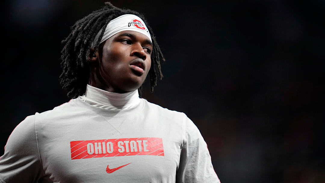 Ohio State Buckeyes wide receiver Jeremiah Smith (4) warm ups before the start of the College Football Playoff National Championship at Mercedes-Benz Stadium in Atlanta on January 20, 2025.