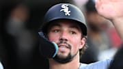 Sep 5, 2025; Detroit, Michigan, USA;  Chicago White Sox center fielder Dominic Fletcher (5) celebrates in the dugout after scoring a run against the Detroit Tigers in the third inning at Comerica Park. Mandatory Credit: Lon Horwedel-Imagn Images