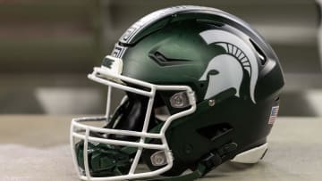 Nov 24, 2023; Detroit, Michigan, USA; A Michigan State Spartans helmet sits on a bench during the second half game against the Penn State Nittany Lions at Ford Field. Mandatory Credit: David Reginek-USA TODAY Sports
