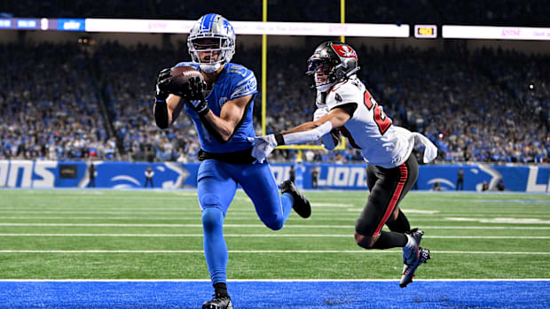 Jan 21, 2024; Detroit, Michigan, USA; Detroit Lions wide receiver Amon-Ra St. Brown (14) makes a catch for a touchdown