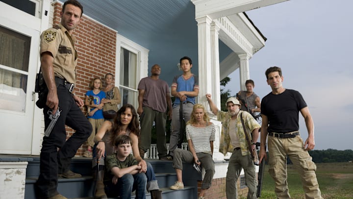 Andrew Lincoln, Madison Lintz, Melissa Suzanne McBride, Sarah Wayne Callies, Chandler Riggs, IronE Singleton, Steven Yeun, Laurie Holden, Jeffrey DeMunn, Norman Reedus, and Jon Bernthal - The Walking Dead _ Season 2 _ Gallery - Photo Credit: Matthew Welch/AMC