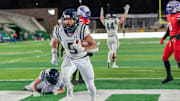 Columbine junior James Basinger (9) runs the ball into the end zone during the Colorado 5A football state championship against Cherry Creek on Saturday, December 2, 2023 at Canvas Stadium in Fort Collins, Colo.