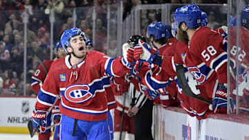 Apr 16, 2024; Montreal, Quebec, CAN; Montreal Canadiens forward Alex Newhook (15) celebrates with teammates after scoring a goal against the Detroit Red Wings during the first period at the Bell Centre. Mandatory Credit: Eric Bolte-USA TODAY Sports