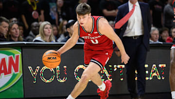 Feb 9, 2025; College Park, Maryland, USA; Rutgers Scarlet Knights guard Jordan Derkack (0) handles the ball during the first half against the Maryland Terrapins at Xfinity Center. Mandatory Credit: Reggie Hildred-Imagn Images