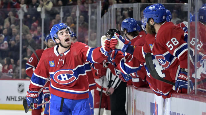 Apr 16, 2024; Montreal, Quebec, CAN; Montreal Canadiens forward Alex Newhook (15) celebrates with teammates after scoring a goal against the Detroit Red Wings during the first period at the Bell Centre. Mandatory Credit: Eric Bolte-USA TODAY Sports