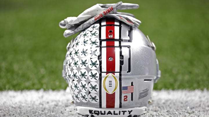 Jan 1, 2021; New Orleans, LA, USA;  Ohio State Buckeyes wide receiver Chris Olave (2) helmet and gloves during warm-ups before their game against Clemson Tigers during the College Football Playoff semifinal at the Allstate Sugar Bowl in the Mercedes-Benz Superdome in New Orleans on Friday, Jan. 1, 2021. Mandatory Credit: Ken Ruinard-USA TODAY Sports