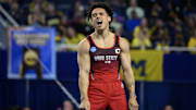 Apr 19, 2025; Ann Arbor, MI, USA; Ohio State gymnast Kameron Nelson reacts after completing his floor exercise routine during the NCAA Men’s Gymnastics National Championship at Crisler Center.