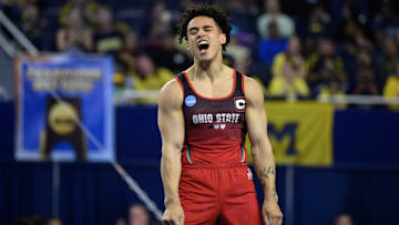 Apr 19, 2025; Ann Arbor, MI, USA; Ohio State gymnast Kameron Nelson reacts after completing his floor exercise routine during the NCAA Men’s Gymnastics National Championship at Crisler Center.