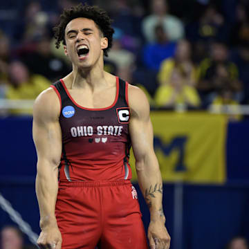 Apr 19, 2025; Ann Arbor, MI, USA; Ohio State gymnast Kameron Nelson reacts after completing his floor exercise routine during the NCAA Men’s Gymnastics National Championship at Crisler Center.