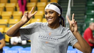 Washington Mystics forward Aaliyah Edwards celebrates before a game against the Chicago Sky.