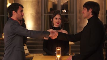 Emily in Paris. (L to R) Eugenio Franceschini as Marcello, Lily Collins as Emily, Lucas Bravo as Gabriel in episode 408 of Emily in Paris. Cr. Courtesy of Netflix © 2024