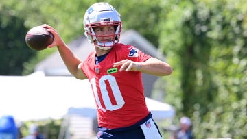 Jul 26, 2024; Foxborough, MA, USA; New England Patriots quarterback Drake Maye (10) throws a pass during training camp at Gillette Stadium. Mandatory Credit: Eric Canha-USA TODAY Sports