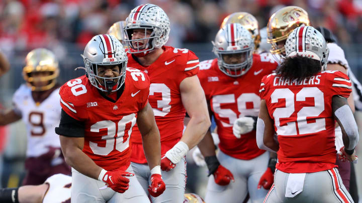 Nov 18, 2023; Columbus, Ohio, USA;  Ohio State Buckeyes linebacker Cody Simon (30) celebrates the tackle for loss during the first quarter against the Minnesota Golden Gophers at Ohio Stadium.