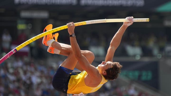 Aug 23, 2023; Budapest, Hungary; Armand Duplantis aka Mondo Duplantis (SWE) clears 18-10 3/4 (5.75m) in the pole vault qualifying during the World Athletics Championships Budapest 23 at National Athletics Centre. Mandatory Credit: Kirby Lee-USA TODAY Sports