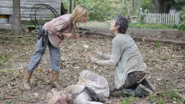 Lizzie (Brighton Sharbino), Carol (Melissa Suzanne McBride) and Walker - The Walking Dead _ Season 4, Episode 14 - Photo Credit: Gene Page/AMC