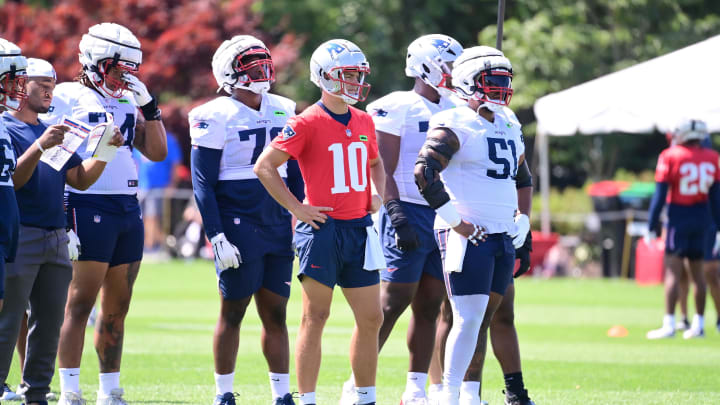 Jul 26, 2024; Foxborough, MA, USA; New England Patriots quarterback Drake Maye (10) waits for a drill to start during training camp at Gillette Stadium. Mandatory Credit: Eric Canha-USA TODAY Sports