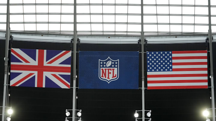 British, NFL and American flags fly before a 2024 NFL game in London.
