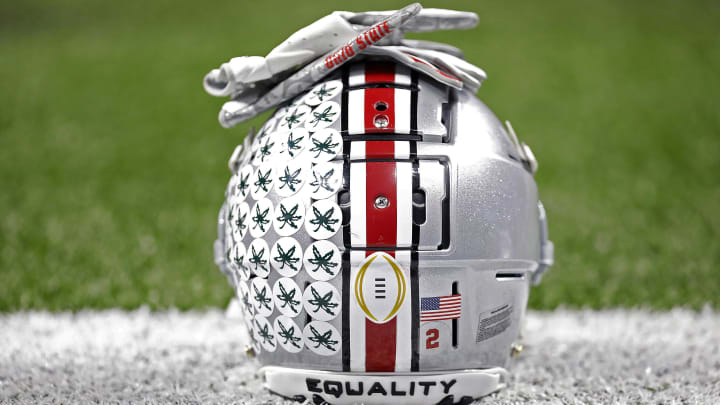 Jan 1, 2021; New Orleans, LA, USA;  Ohio State Buckeyes wide receiver Chris Olave (2) helmet and gloves during warm-ups before their game against Clemson Tigers during the College Football Playoff semifinal at the Allstate Sugar Bowl in the Mercedes-Benz Superdome in New Orleans on Friday, Jan. 1, 2021. Mandatory Credit: Ken Ruinard-USA TODAY Sports