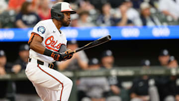 Apr 30, 2025; Baltimore, Maryland, USA; Baltimore Orioles outfielder Cedric Mullins (31) hits a single during the first inning against the New York Yankees at Oriole Park at Camden Yards. 