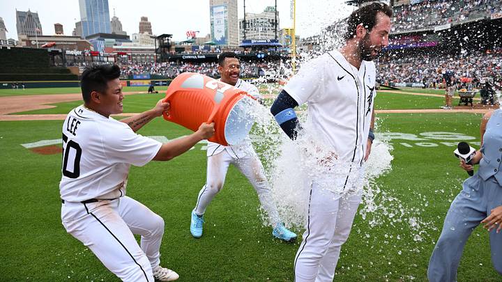 Jun 21, 2026; Detroit, Michigan, USA;  Detroit Tigers center fielder Matt Vierling (right) gets doused by his teammates Hao-Yu Lee (left) and Jahmai Jones (18) after hitting a walk-off single to beat the Chicago White Sox in the tenth inning at Comerica Park. Mandatory Credit: Lon Horwedel-Imagn Images