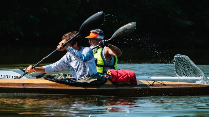 Boaters compete during the Tuscarawas County Canoe and Kayak Race, Saturday, July, 13, on the Tuscarawas River.