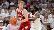Indiana's Luke Goode (10) defended by Ohio State's Evan Mahaffey (12) at Value City Arena. 