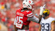 Nebraska linebacker Dasan McCullough signals after a stop against Michigan.