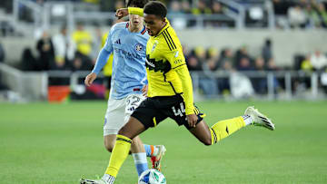 Mar 22, 2025; Columbus, Ohio, USA;  Columbus Crew midfielder Tristan Brown (44) kicks the ball during the second half against the New York City at Lower.com Field. Mandatory Credit: Joseph Maiorana-Imagn Images