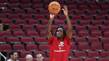 Louisville basketball's Mike James (0) warms up ahead of their game against Virginia Tech at the KFC Yum! Center in Louisville, Ky. on Mar. 5, 2024.