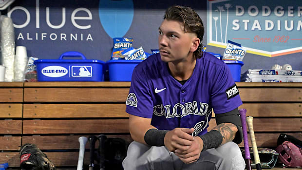 Colorado Rockies Jordan Beck waits in the dugout prior to the game against the Los Angeles Dodgers