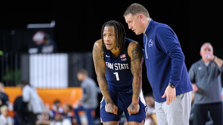 Penn State Nittany Lions guard Ace Baldwin Jr. (1) and head coach Mike Rhoades