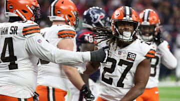 Jan 13, 2024; Houston, Texas, USA;Cleveland Browns running back Kareem Hunt (27) celebrates his touchdown against the Houston Texans  in a 2024 AFC wild card game at NRG Stadium. Mandatory Credit: Thomas Shea-Imagn Images