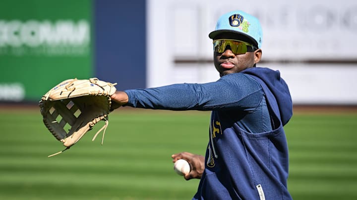 Milwaukee Brewers outfielder Luis Lara plays catch during spring training workouts Tuesday, February 17, 2026, at American Family Fields of Phoenix in Phoenix, Arizona.