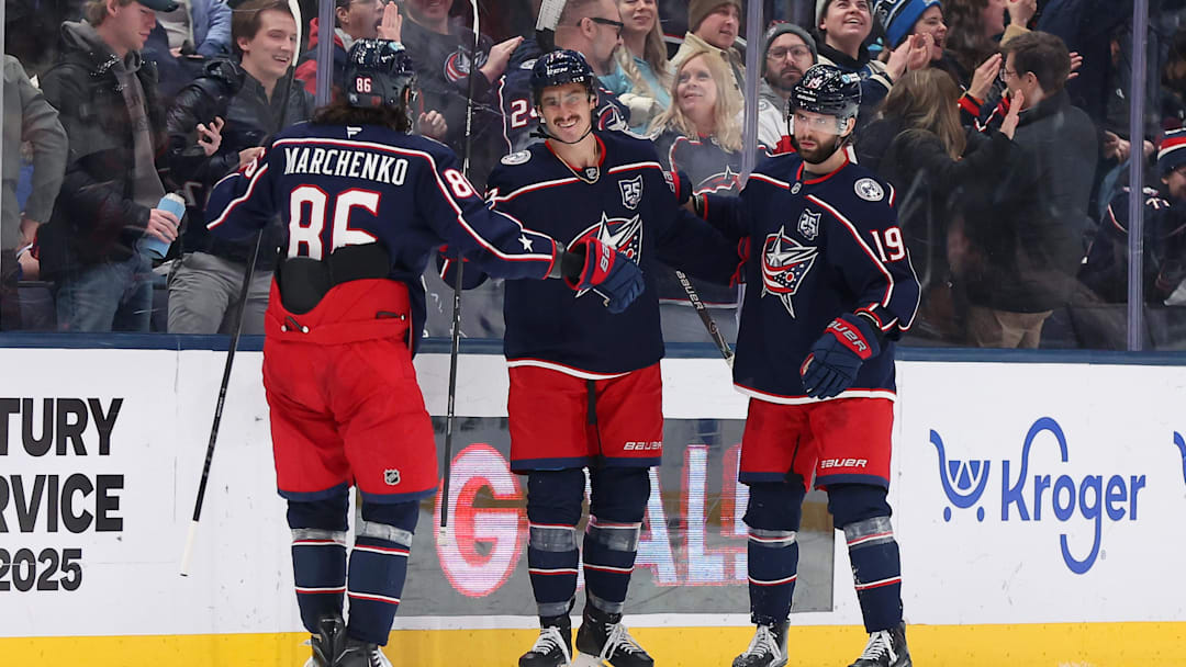 Jan 24, 2026; Columbus, Ohio, USA;  Columbus Blue Jackets left wing Mason Marchment (17) celebrates his third goal of the game with right wing Kirill Marchenko (86) and center Adam Fantilli (19) during the third period against the Tampa Bay Lightning at Nationwide Arena. Mandatory Credit: Joseph Maiorana-Imagn Images