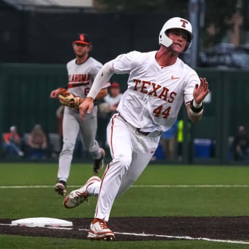 Texas Longhorns outfielder Max Belyeu (44) rounds third base after a hit team mate's hit during the game against Oklahoma State at UFCU Disch–Falk Field on Friday, May. 3, 2024 in Austin.