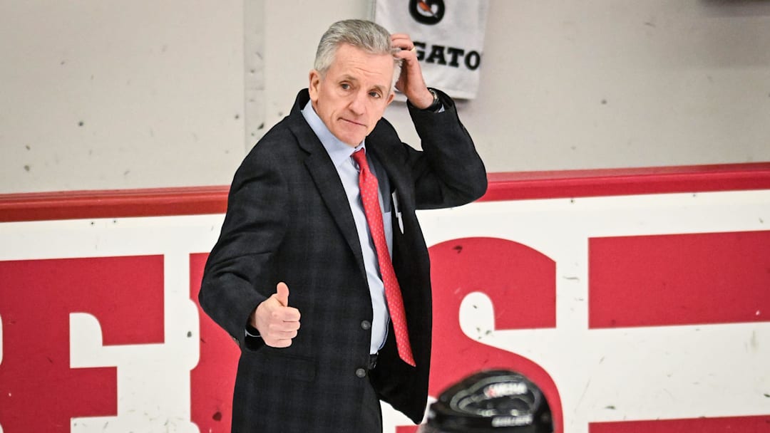 Wisconsin Badgers head coach Mark Johnson acknowledges an official after an 11-0 victory against the Bemidji State Beavers in a WCHA first-round game Saturday, March 1, 2025, at LaBahn Arena in Madison, Wisconsin.