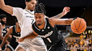 UW-Milwaukee Panthers guard Themus Fulks (1) drives to the basket against Oakland Golden Grizzlies guard Isaiah Jones (7) during the second half in a game Thursday, February 27, 2025, at the UWM Panther Arena in Milwaukee, Wisconsin. UWM won, 71-66.
