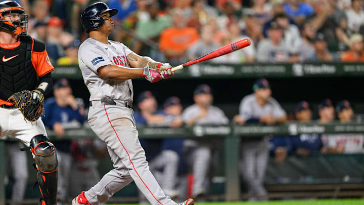 Rafael Devers admires his home run